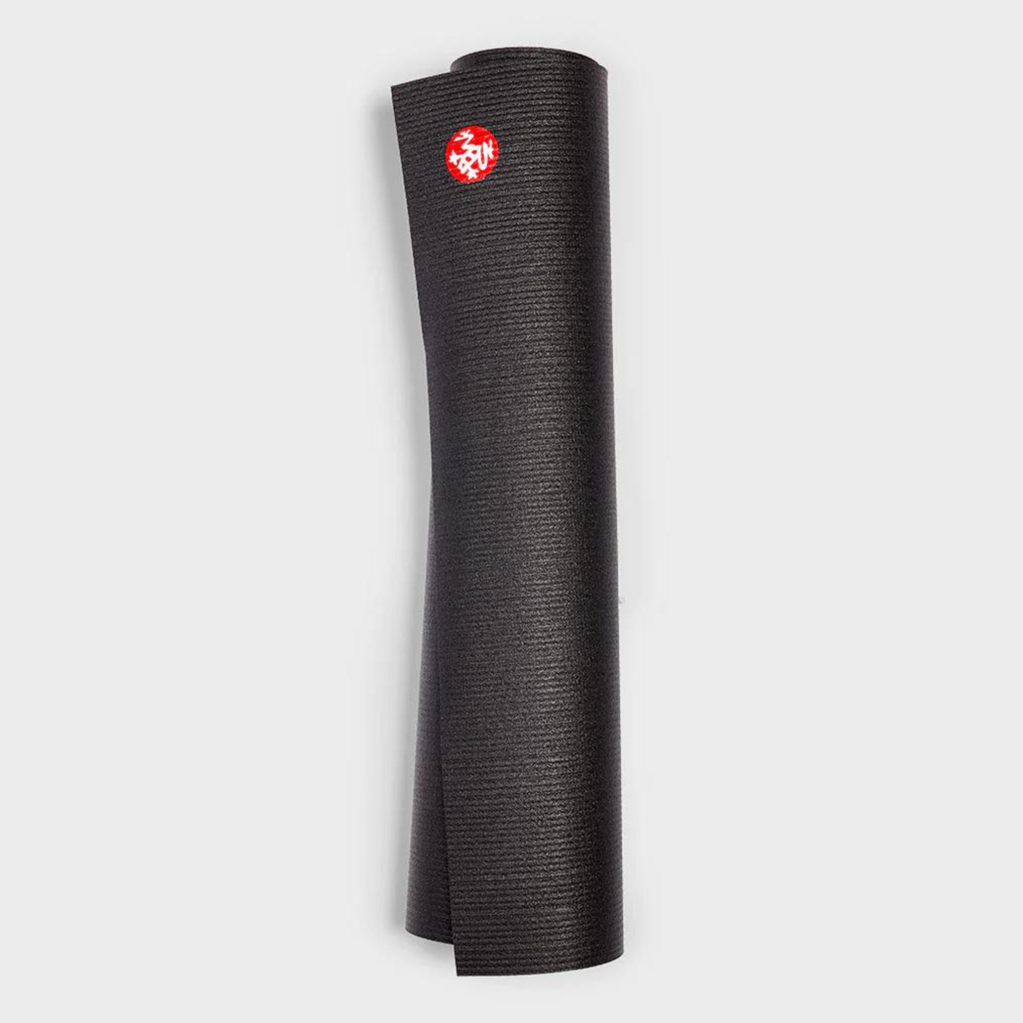 black manduka pro lite mat rolled up