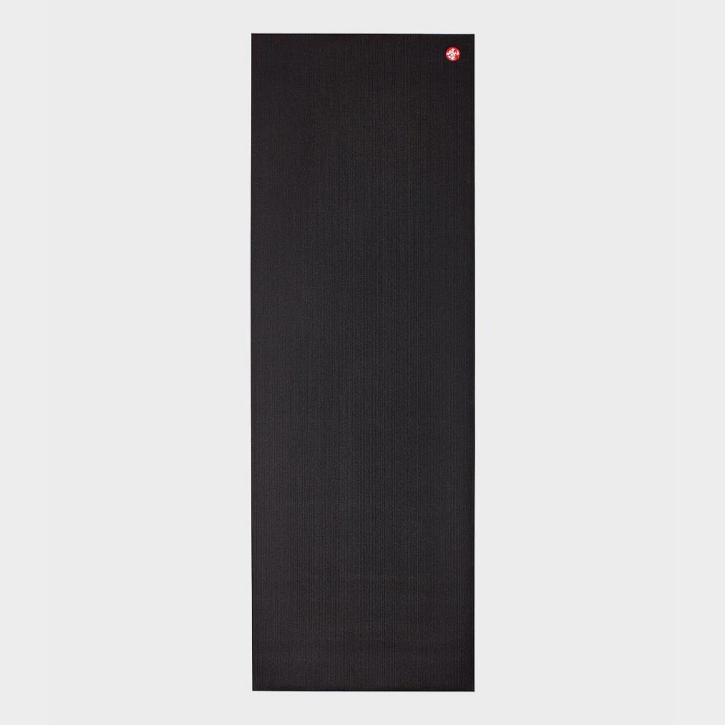 black manduka prolite yoga mat rolled flat