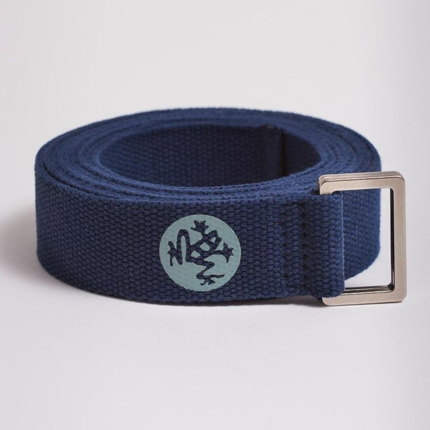 rolled up navy yoga strap with silver buckles