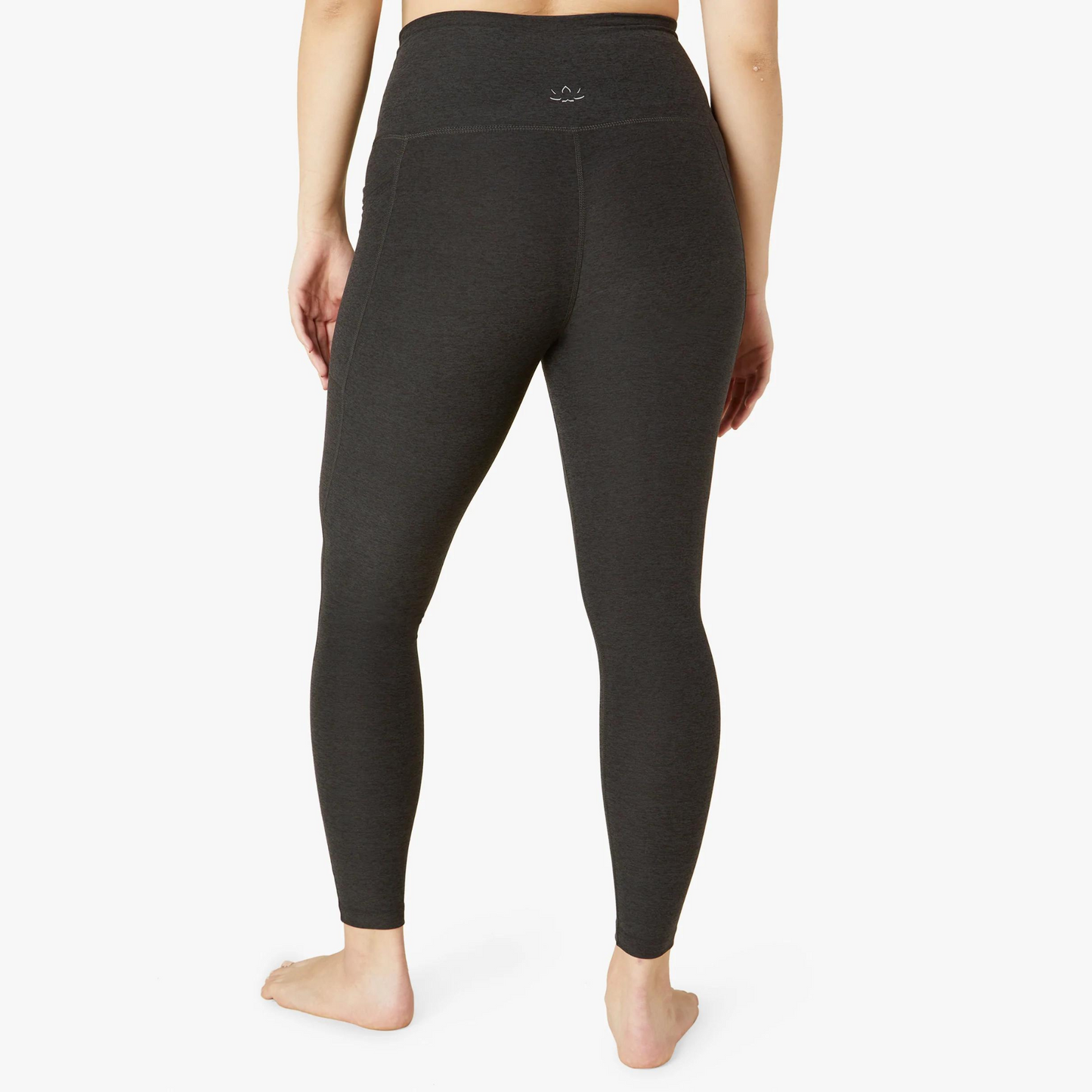 back of dark charcoal midi length legging
