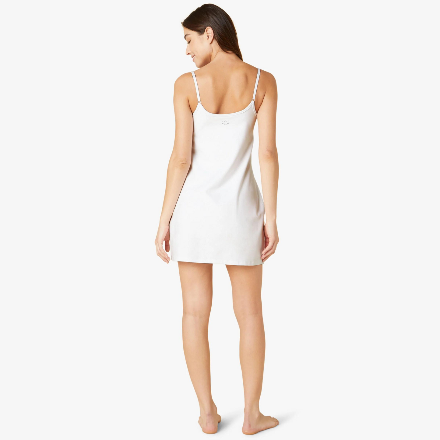 back of white fitted mid thigh thin strap dress