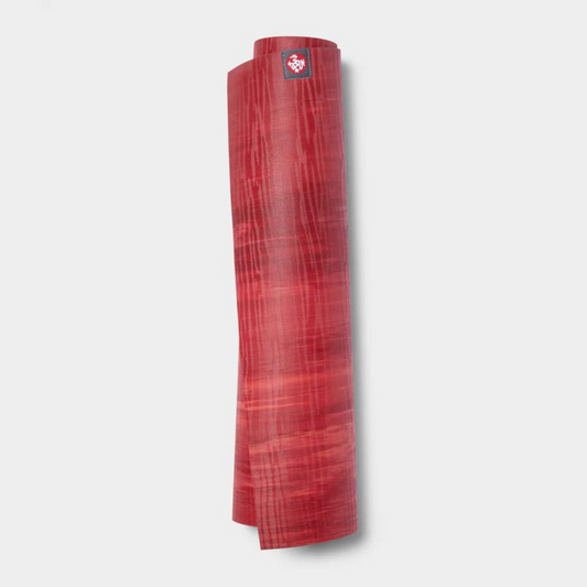 rose marble colored rubber rolled up yoga mat
