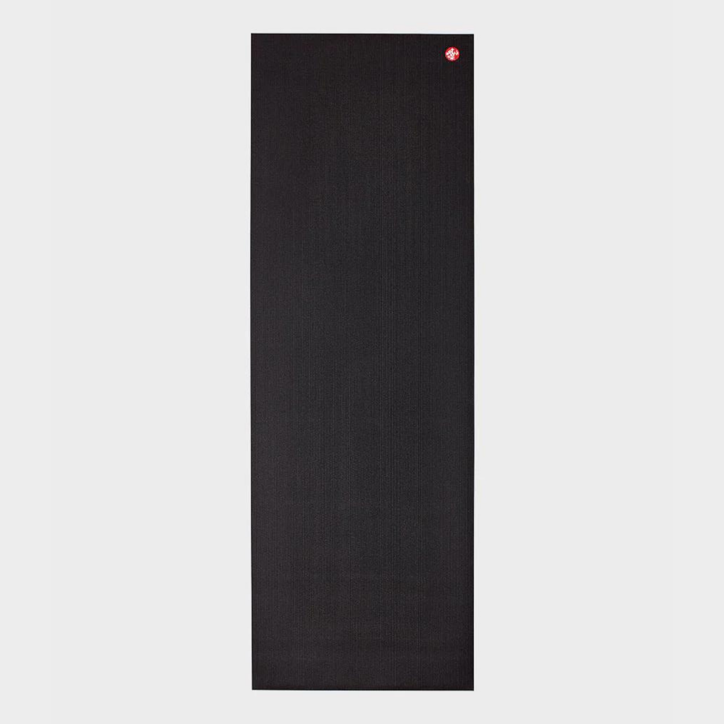 black manduka prolite yoga mat rolled flat 