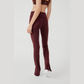 back of espresso colored flare yoga pants with small slit at the ankle