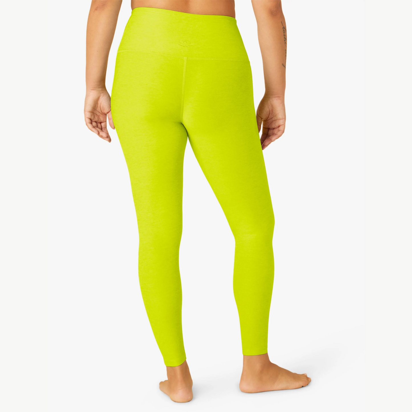 back view of bright lime green leggings