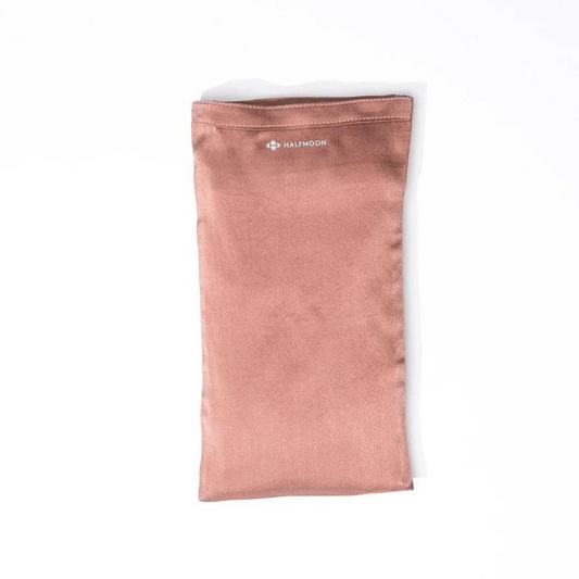 silky rose rectangular eye pillow with opening at short end and HALFMOON written across the opening