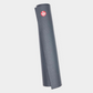 dark grey manduka prolite yoga mat rolled up